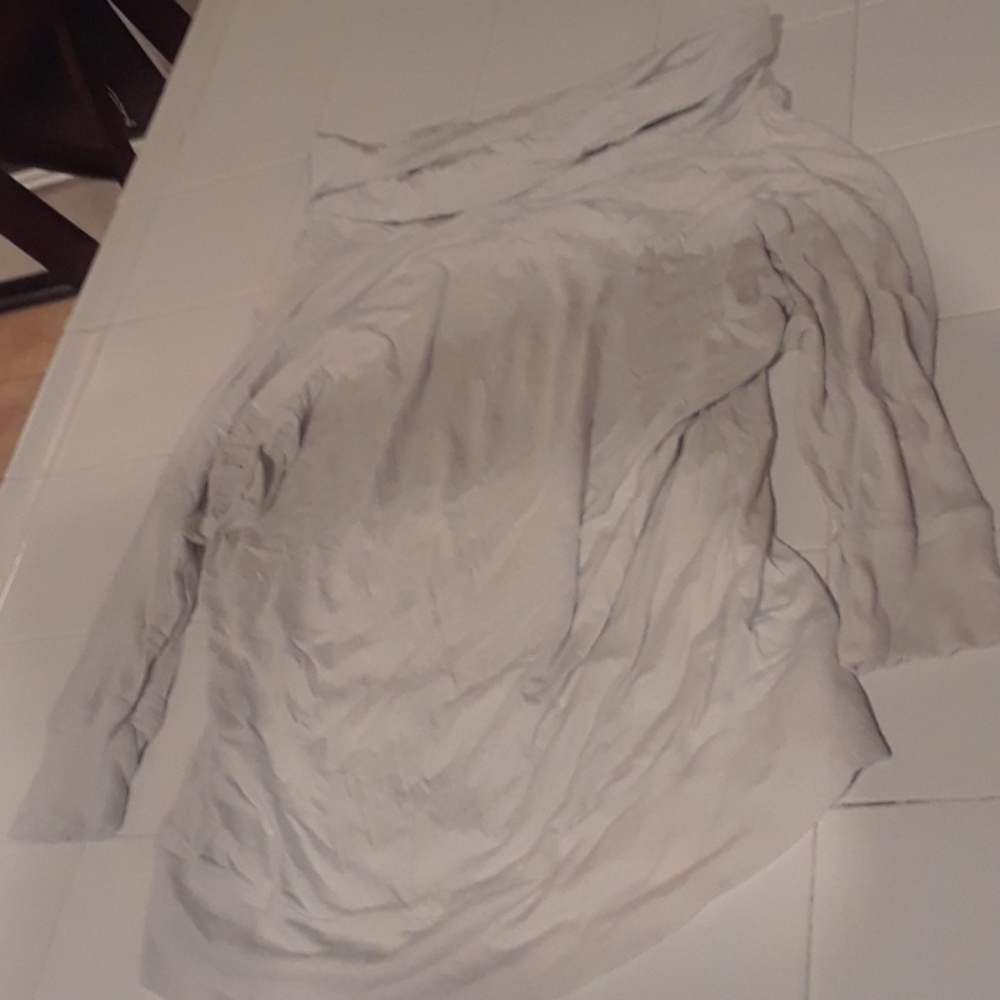 A turtle neck, forarm sleeved.